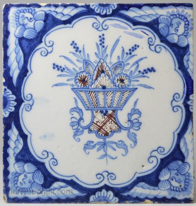 Liverpool Delft tile with angel head corners, circa 1760