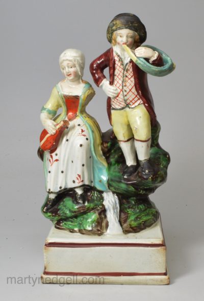 Staffordshire pearlware figure of musicians, circa 1820