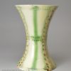 Creamware pottery spill vase decorated with colours under the glaze, circa 1770
