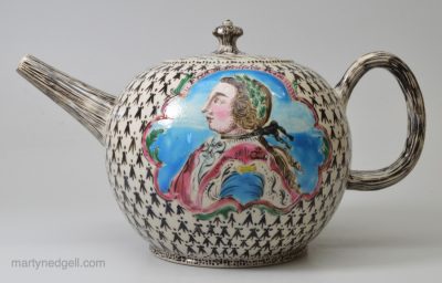 Staffordshire white saltglaze stoneware teapot commemorating Fredrick II King of Prussia, circa 1770