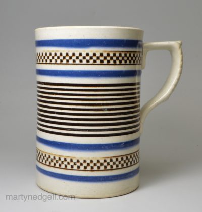 Pearlware pottery mug with inlaid mocha decoration, circa 1840