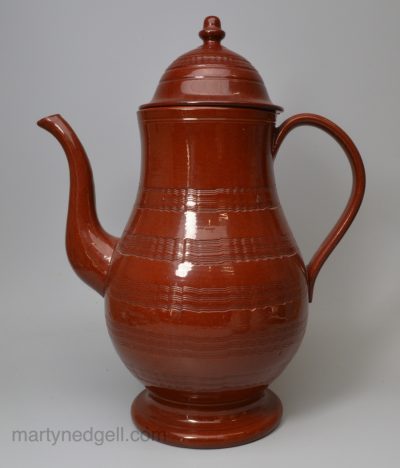 Philadelphia glazed redware coffee pot in imitation of Staffordshire red stoneware, circa 1820, possibly Thomas Haig's Northern Liberty Pottery