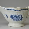 Worcester porcelain sauce boat painted with the Strap Flue Sauceboat Floral pattern, circa 1770