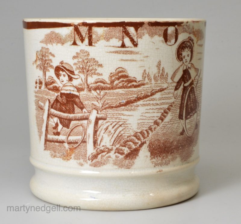 Pearlware pottery child's mug 'M N O', circa 1840