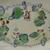 Pearlware pottery moulded dish coloured under the glaze, circa 1790