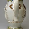 Prattware pottery jug moulded with the Miser, circa 1800