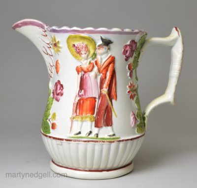 Pearlware pottery jug moulded with Dandies and decorated over the glaze, circa 1820