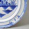Pearlware pottery plate painted with a pagoda in underglaze blue, circa 1800