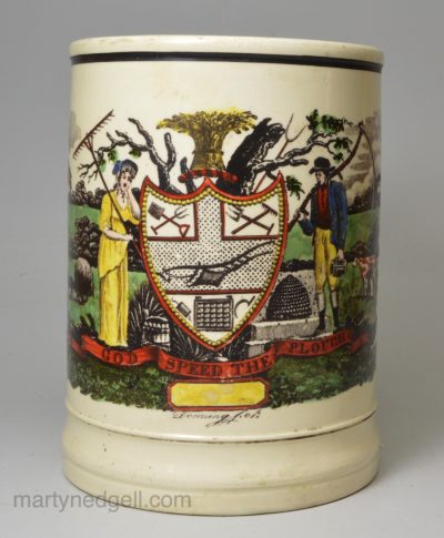 Creamware pottery mug decorated with a print by Downing 'FARMERS ARMS', circa 1800 probably Newcastle Pottery