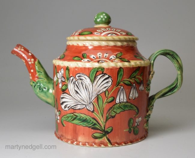 Creamware pottery teapot decorated with enamels over the glaze, circa 1770