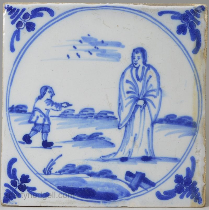 London delft Biblical tile, 'The Mocking of Elijah',circa 1750