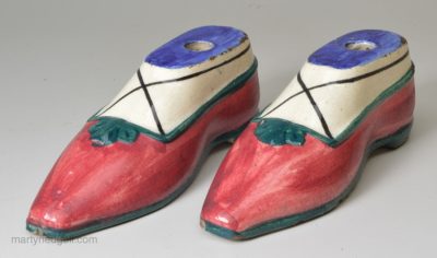 Pair of pearlware pottery shoe inkwells, circa 1820, possibly Scottish