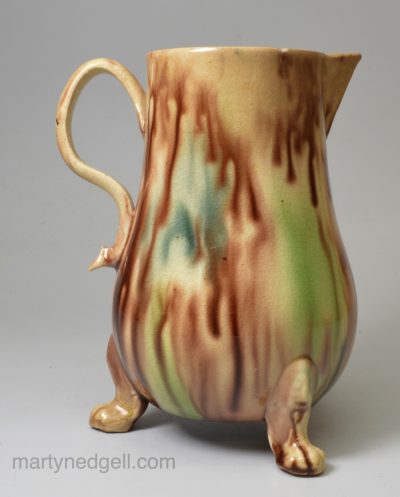Creamware pottery jug with Whieldon type decoration, circa 1770