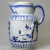 Pearlware pottery serving jug moulded with the Parson, Clerk and Sexton, circa 1800