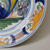 Dutch Delft polychrome charger, circa 1750