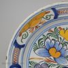 Dutch Delft polychrome charger, circa 1750