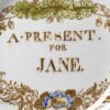 Pearlware pottery Childs plate printed with 'A PRESENT FOR JANE', circa 1820