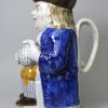 Prattware pottery Toby jug decorated with enamels under a pearlware glaze, circa 1820