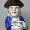 Prattware pottery Toby jug decorated with enamels under a pearlware glaze, circa 1820