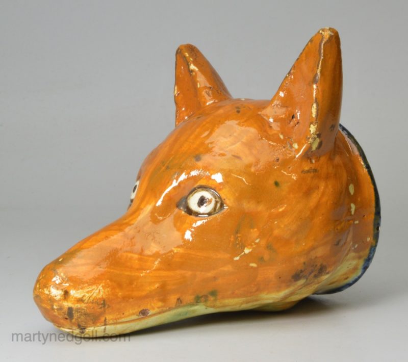 Prattware pottery fox head stirrup cup, circa 1820