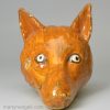 Prattware pottery fox head stirrup cup, circa 1820