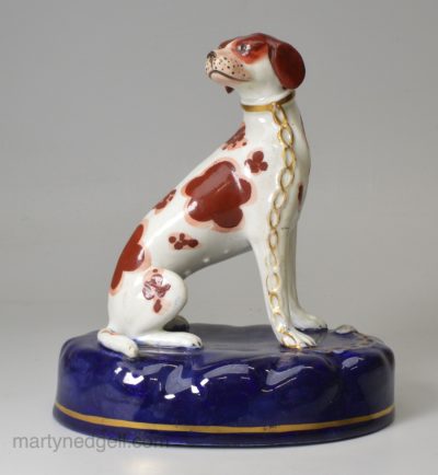 Staffordshire porcelain figure of a chained hound, circa 1840