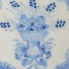 Liverpool Delft tile painted in blue with angel head corners, circa 1760