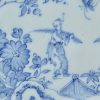 Liverpool delft plate decorated with a chinaman in blue and a powder blue border, circa 1750