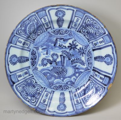 Dutch Delft charger painted in a Kraak style in blue, circa 1700