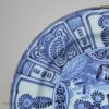 Dutch Delft charger painted in a Kraak style in blue, circa 1700