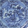 Dutch Delft charger painted in a Kraak style in blue, circa 1700