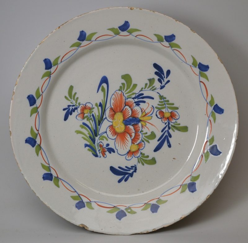 London Delft polychrome charger, circa 1750