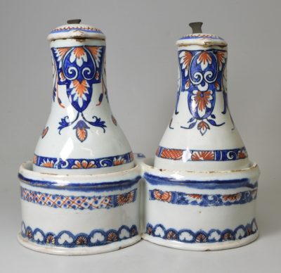 French tin glaze condiment, oil and vinegar bottles and stand, circa 1800, probably Rouen