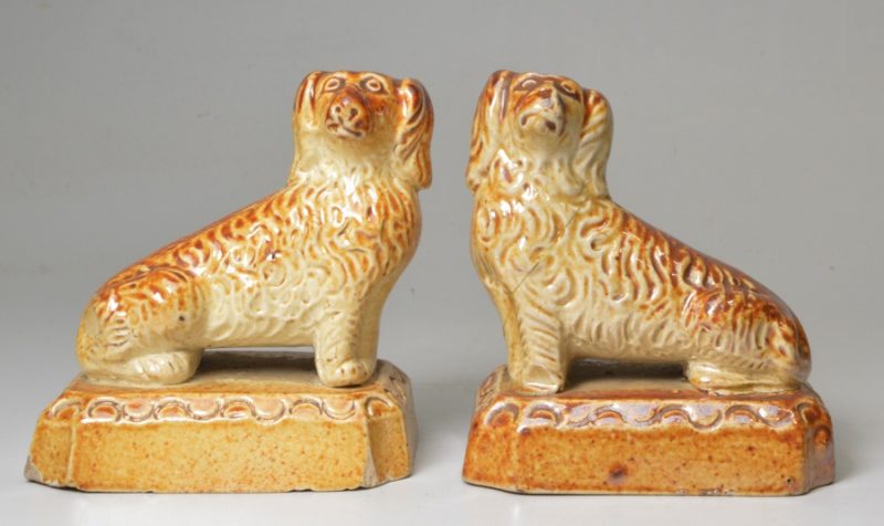 Pair of salt glazed stoneware spaniels, circa 1840, Brampton Pottery