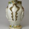 Prattware pottery jug moulded with the Miser and Spendthrift, circa 1820