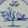 London delft charger painted with a Chines man in blue, circa 1750