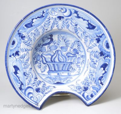 German tin glazed barber's bowl, decorated in blue with a bird and apples, circa 1740
