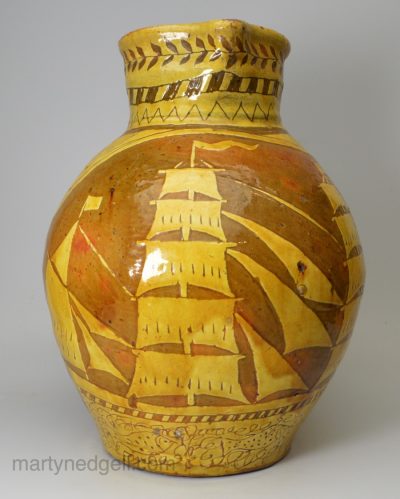 North Devon slipware jug decorated with nautical sgraffito work, circa 1820