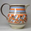 Mochaware snail trail and cat's eye decorated jug with a make do handle, circa 1820