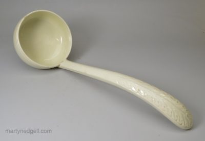 Large creamware pottery soup tureen ladle, circa 1800