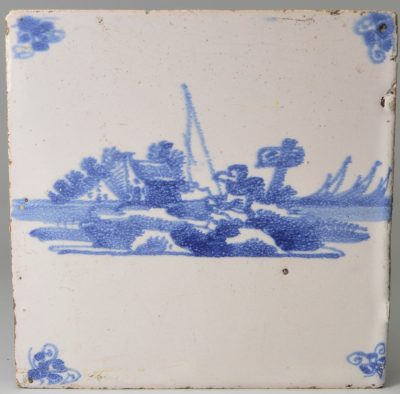 Dutch Delft tile painted in blue with a fisherman, circa 1750