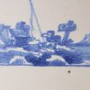 Dutch Delft tile painted in blue with a fisherman, circa 1750