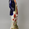 Large Staffordshire pottery figure of the blind violinist and his spaniel, circa 1860