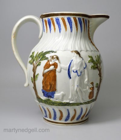 Prattware pottery jug moulded with Lady Templeton's Offering to Peace and Grooms Carousing, circa 1800
