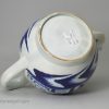 Pearlware pottery lidless teapot decorated in blue under the glaze, circa 1800