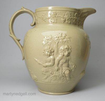 Large drab body jug moulded with Bacchanalian boys, circa 1820, Spode Pottery Staffordshire