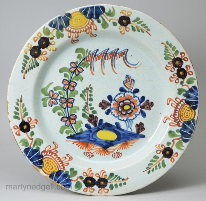 London delft polychrome plate, circa 1760