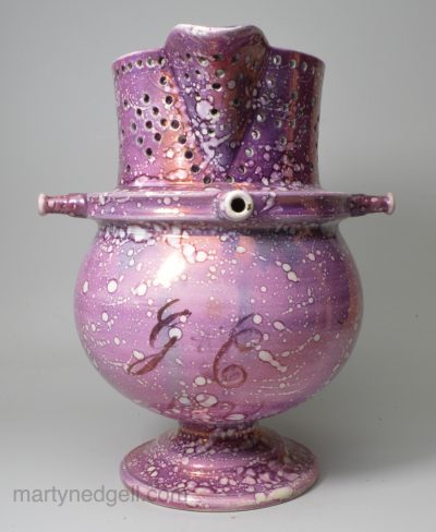 Large pink splash lustre pottery puzzle jug, circa 1820