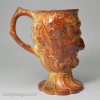 Saltglaze stoneware Bacchus mug, circa 1840 probably Brampton Pottery