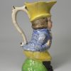 Staffordshire pearlware pottery jug moulded as Paul Pry, circa 1820